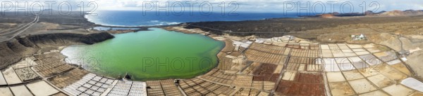 Salt mining plant, Salinas de Janubio with green Laguna de Janubio, near Yaiza, aerial view, Lanzarote, Canary Islands, Spain