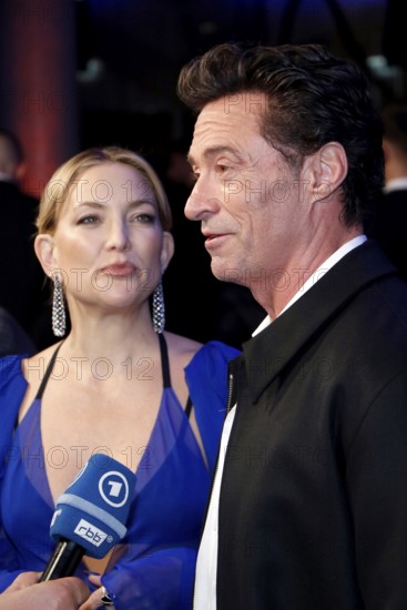 Kate Hudson and Hugh Jackman at the Song Sung Blue Red Carpet Photocall at Zoo Palast Berlin on 19.11.2025