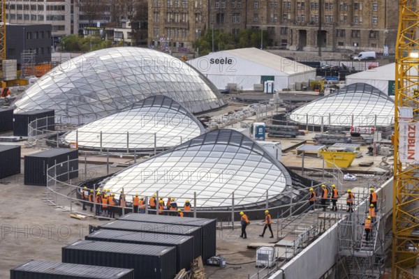 Stuttgart Central Station. Stuttgart 21 construction site. The new transit station is being built here. Light eyes on the roof of the new train station. Bonatz building. Construction site tour with a group of visitors. Stuttgart, Baden-Württemberg, Germany