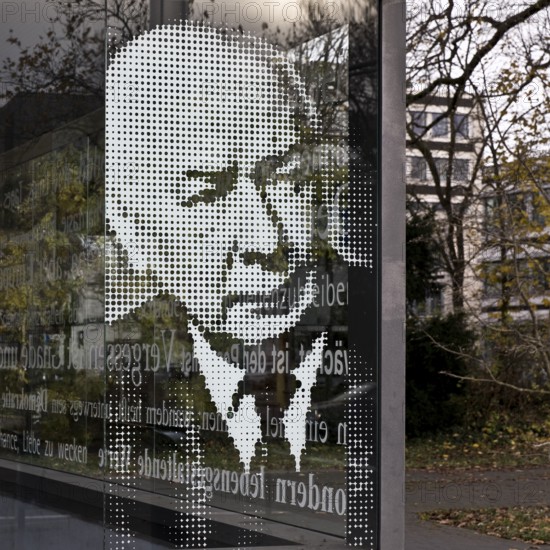 Graphically gridded portrait of Federal President Theodor Heuss on the glass panel at the Heussallee and Museumsmeile subway exit, Bonn, North Rhine-Westphalia, Germany