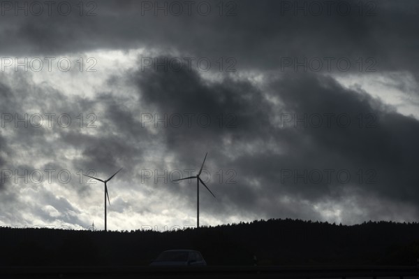 Wind turbines in thunderstorm rain, Bavarian Forest, Bavaria, Germany