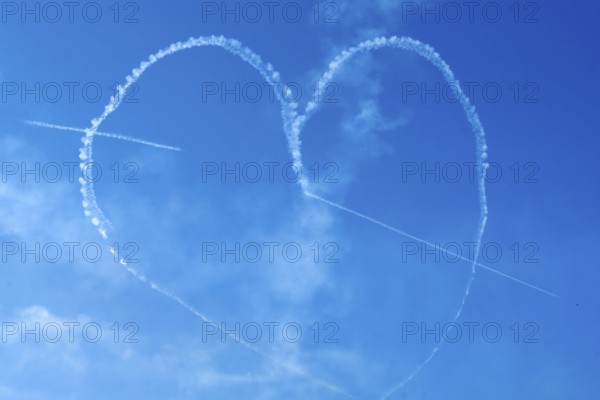 The Indian Air Force aerobatic team performs during an air show as part of the 93rd Air Force Day celebrations on November 8, 2025 in Guwahati, India