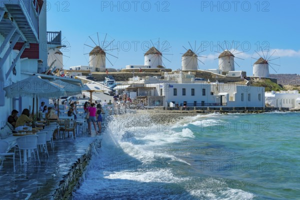 Mykonos, Cyclades, Greece - The six sixteenth-century windmills, lined up on a hill above Mykonos Town, Mykonos Chora, are the island's landmark. Mykonos is part of the Cyclades archipelago in the Aegean Sea