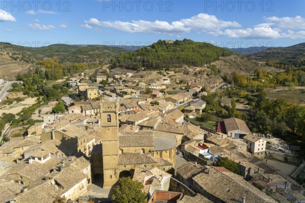 Church tower and rooftops of medieval village of Uncastillo, Cinco Villas, Zaragoza province, Aragon, Spain