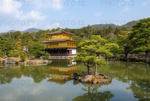 Golden Pavilion reflected in pond, Japanese garden, Golden Pavilion Temple, Kinkaku-ji reliquary, Buddhist temple complex, Kyoto, Japan