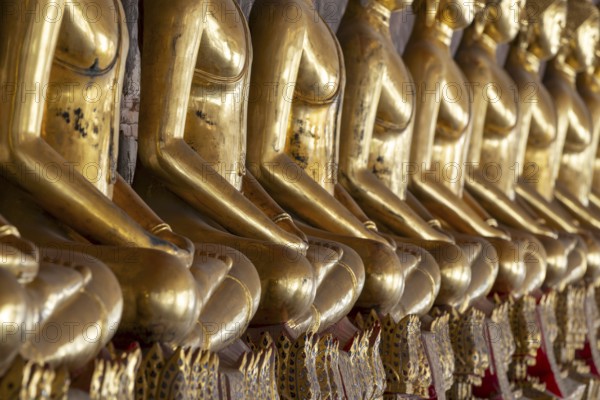 Gilded Buddha statues (Bhumispara mudra: Buddha Gautama at the moment of enlightenment), Wat Suthat Thepwararam, Royal Temple, Phra Nakhon, Bangkok, Thailand