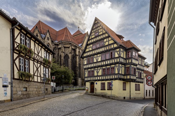 Half-timbered houses in a historic old town in sunshine and cobblestone streets, The old town of Arnstadt in Thuringia