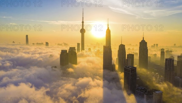 City scape emerging from a dense enveloping fog in sunrise and skyscrapers piercing the haze, big metropolis with skyline, mist on ground, blue sky, city in an aerial view, AI generated