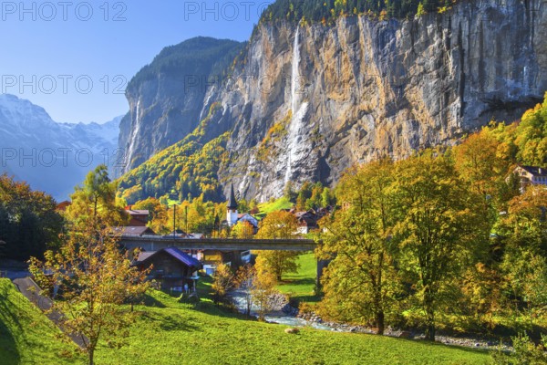 View of town and valley with Staubbach waterfall in autumn, Lauterbrunnen, Bernese Oberland, Canton of Bern, Switzerland