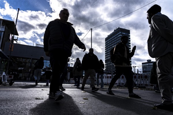 Passers-by in downtown Essen at the main train station, North Rhine-Westphalia, Germany
