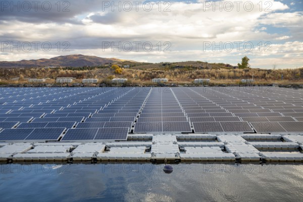 Park City, Utah - Floating solar panels provide power for Mountain Regional Water. The solar array is on the raw water storage pond at the water utility's Signal Hill Treatment Plant