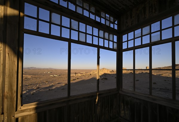 View from a former dwelling house into the desert, Kolmanskop, restricted diamond area, Karas region, Namibia