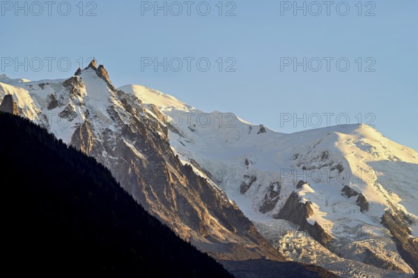 From left snow-covered Aiguille du Midi, Mont-Blanc, Vallot Hut, Chamonix-Mont-Blanc, Haute-Savoie, France