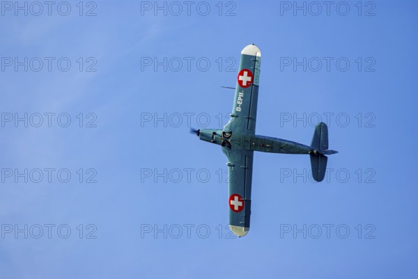 A Pilatus P-2 of Pilatus Flugzeugwerke AG with the registration D-EPII during a flight demonstration as part of an air show at the Rossfeld in Metzingen-Glems, Baden-Württemberg, Germany, for editorial use only