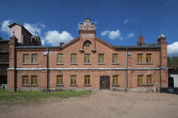 Brick façade with inscription Werla, former paper factory and mill for the production of groundwood pulp board, UNESCO World Heritage Site Factory Village Verla, Maailmanperintökohde Verlan puuhiomo ja pahvitehdas, Verla Rapids, Kymenlaakso, near Kouvola, Finland