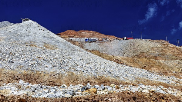 Rocky mountain with loose gravel and blue sky, steeply rising, The silver mines of the Cerro Rico silver mountain near Potosi in Bolivia