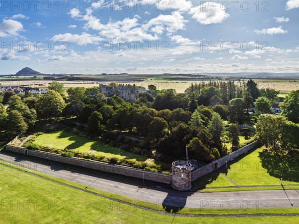 Ruins of Dirleton Castle & Gardens from a drone, Dirleton, East Lothian, Scotland, UK