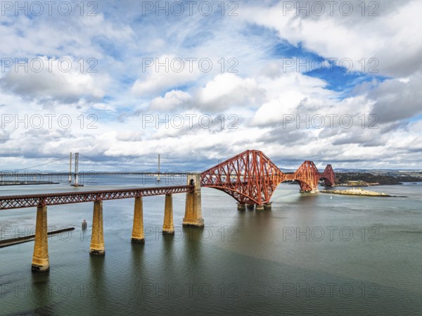 Forth Bridge from a drone, Queensferry Crossing, Forth Estuary, Scotland, United Kingdom