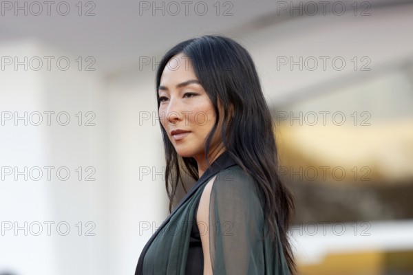 Venice, Italy - 2 September 2025: Greta Lee during the red carpet of - A house of Dynamite - during the 82nd Venice International Film Festival