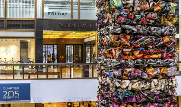 Interior design, artwork made from compressed scrap cars, partially vacant Shopping Quartier 205 in Friedrichstraße and Mohrenstraße, Berlin, Germany