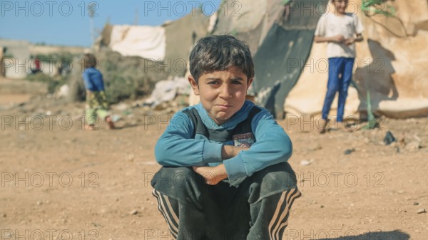 Syrian children playing in a refugee camp near the Turkish border on World Children's Day. Aleppo, Syria October 29, 2022, Aleppo, Syria