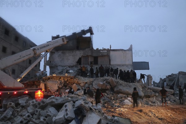 Civil defense teams attempt to rescue civilians trapped under the rubble after a powerful earthquake struck Turkey and Syria, killing tens of thousands. Aleppo, Syria – Feb 6, 2023, aleppo, syria