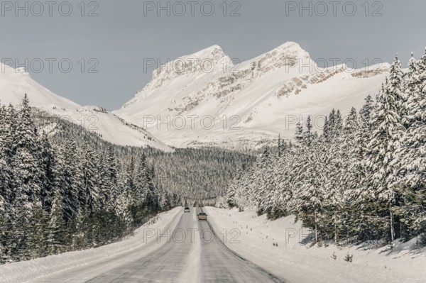 Winter road trip on the Icefields Parkway with lots of snow and ice, Banff National Park, Jasper National Park, Alberta, Canada