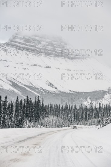 Winter road trip on the Icefields Parkway with lots of snow and ice, Banff National Park, Jasper National Park, Alberta, Canada