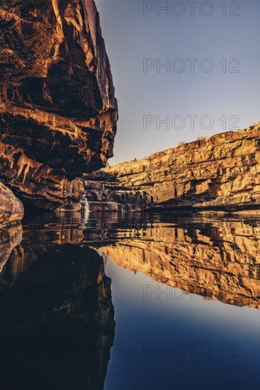 Bell Gorge waterfall, a body of water in north-west Australia in the Kimberley. Sunrise in the outback, Australia