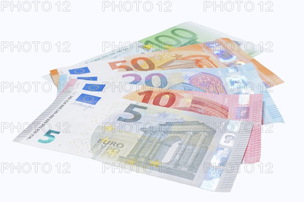 Various euro banknotes on white background, 5 euro, 10 euro, 20 euro, 50 euro, 100 euro