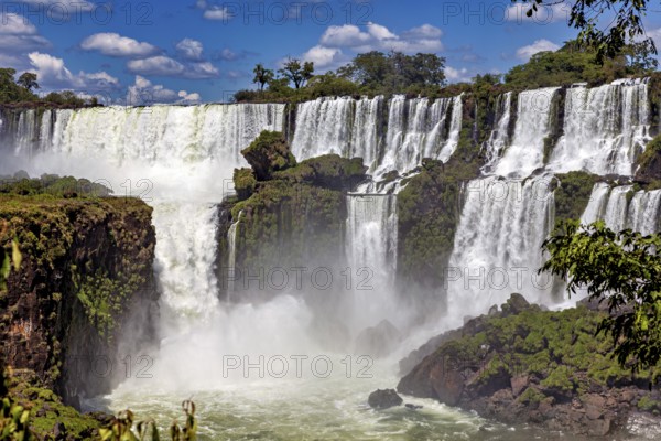 Majestic waterfalls and cliffs in a tropical landscape, The Iguazu Falls between Argentina and Brazil