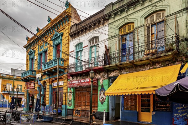 Classic colourful facade of buildings along an urban street, The colourful city and tango district La Bocca in Buenos Aires Argentina