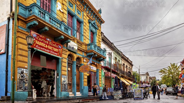 Traditional colourful building facade of a shop on a city street, The colourful city and tango district La Bocca in Buenos Aires Argentina