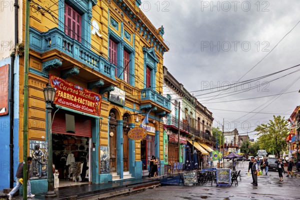 Traditional colourful facade of a shop on an empty city street, The colourful city and tango district La Bocca in Buenos Aires Argentina