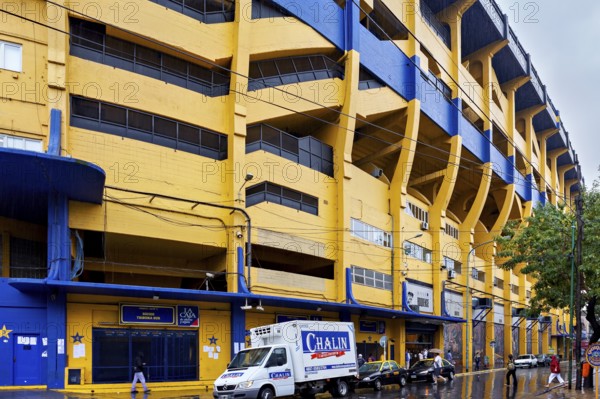 Yellow and blue stadium building on a rainy street, The football stadium of La Bocca of Bocca Juniors in Buenos Aires Argentina