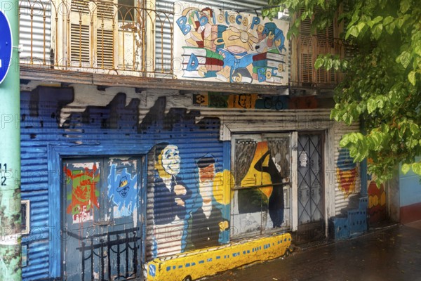 Creative street art on a colourful wall with different colours and motifs, the colourful city and tango district of La Bocca in Buenos Aires Argentina