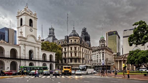 Different architectural styles meet under a cloudy sky in an urban space, Historic buildings in the city of Buenos Aires Argentina