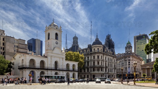 An architectural ensemble with historic buildings and a striking clock tower under a blue sky, The city of Buenos Aires in Argentina