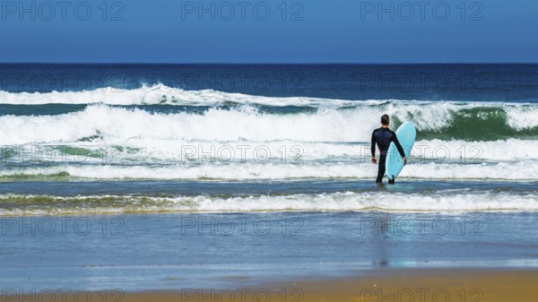 Surfer on Contis beach, Saint Julien en Born, Saint-Julien-en-Born, Landes, France