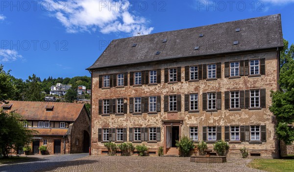 The old castle with Barbarossaplatz and the castle café in the old town centre of Büdingen, Hesse, Germany
