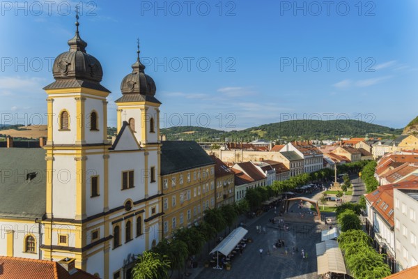 View from the city tower of the Piarist Church of St Francis Xavier and the old town in the evening light, Capital of Culture 2026, Trencín, Slovakia