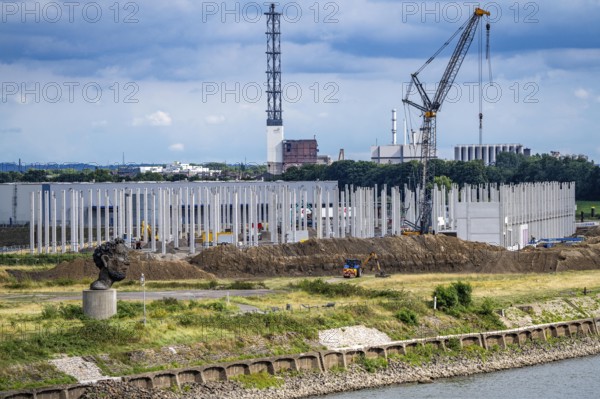 Construction of a new logistics hall on the Mercatroinsel, Hall 2, next to an existing hall, approx. 25, 000 square metres in size, in Duisburg-Ruhrort, shell construction, sculpture The Echo of Poseidon on the Rhine, North Rhine-Westphalia, Germany