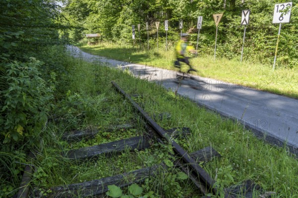 Sauerlandring cycle path, an 84 km long circular cycle path between the towns of Finnentrop, Eslohe, Schmallenberg and Lennestadt, mostly on former railway lines, here near Finnentrop-Serkenrode, old railway traffic signs, Sauerland, North Rhine-Westphalia, Germany