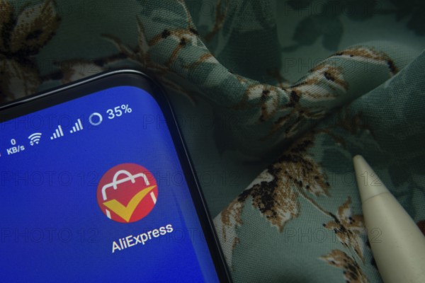 Dhaka, Bangladesh- 07 May 2025: AliExpress app icon is seen on smartphone