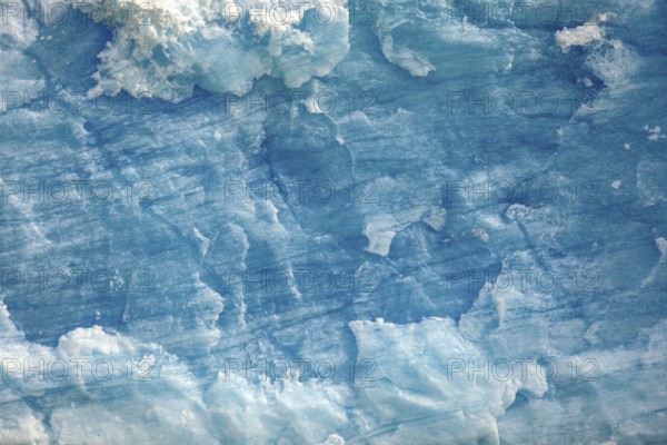 Close-up of textured ice with blue colouring and unique pattern, The blue ice of the Perito Moreno glacier in Patagonia Argentina