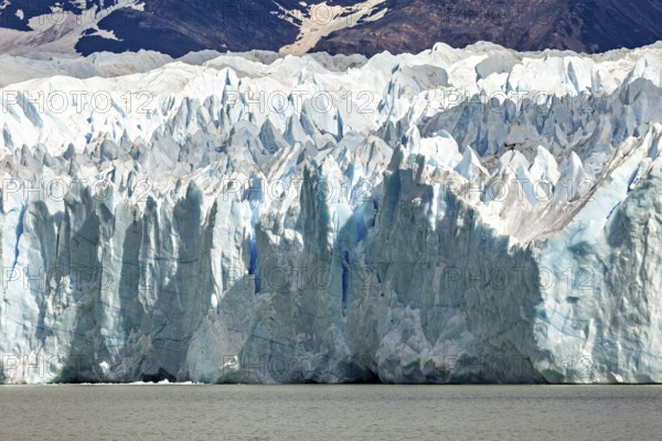 Impressive detail of a glacier with striking blue texture and structures, The Perito Moreno glacier in Argentina
