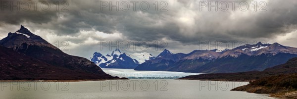 Vast, dramatic landscape in a panoramic format with glaciers and clouds over the horizon, The Perito Moreno glacier in Argentina
