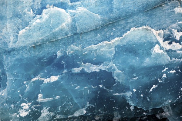 Close-up of blue ice layers with irregular shapes and fine details, The ice of the Perito Moreno glacier in Argentina