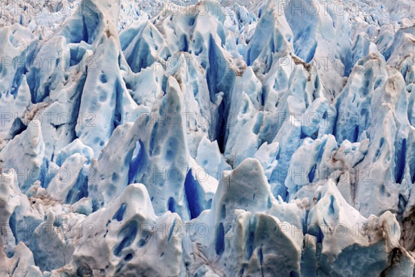 Detailed image of blue and white glacier structures with fascinating ice formations, The ice of the Perito Moreno glacier in Argentina