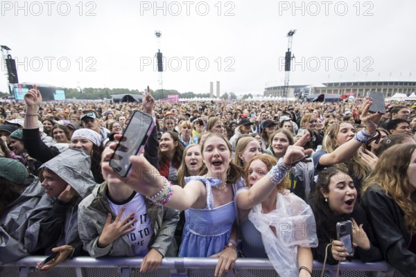 Festival visitors celebrate Mark Ambor's performance at the Lollapalooza Festival in the Olympiastadion and on the Maifeld, Berlin, 12.07.2025